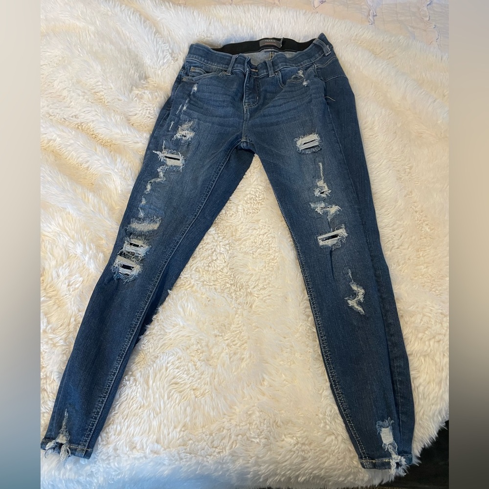 TORRID bombshell skinny distressed